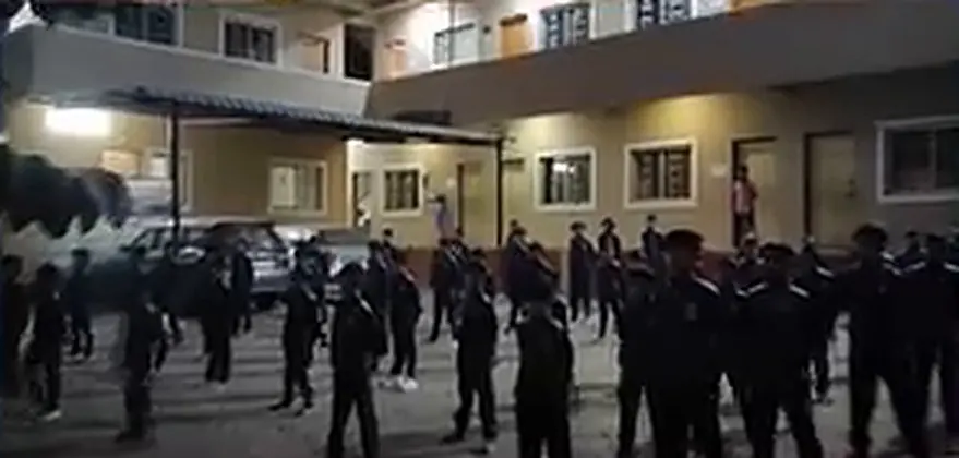 Evening drill in front of the hostel