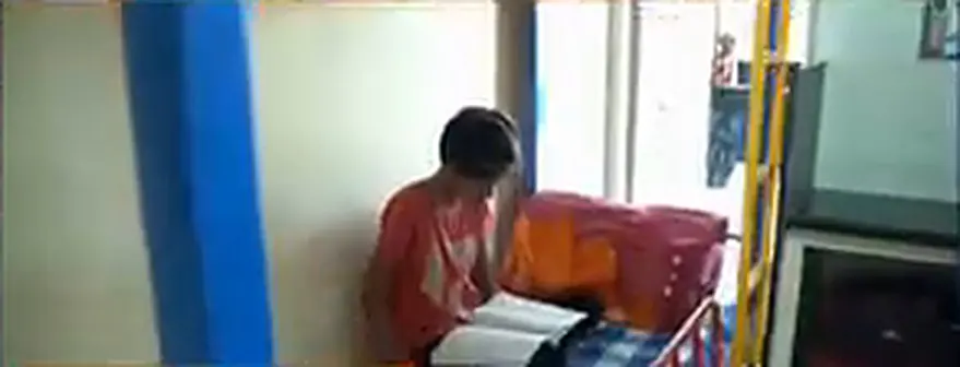 A student at self-study in the hostel